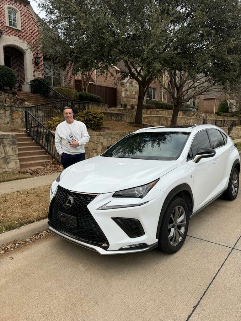 Customer with new vehicle delivery
